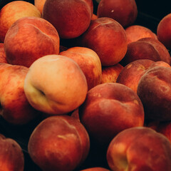 ripe juicy peaches on the market