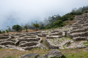 Fototapeta na wymiar Castro de Santa Tegra (Santa Tecla) site in the mist 