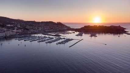 
sunset over the Parador and the port of Baiona