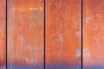 Row of panels made of rusted metal - texture effect. Corten steel.