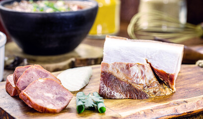 bacon and pepperoni used as ingredients in brazilian bean broth