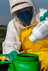 proper technique for mixing pesticides outdoors