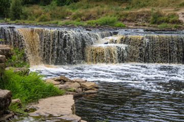 SABLINO, Leningrad REGION, RUSSIA-July, 22, 2021: a beautiful waterfall cascade on the Tosna River...