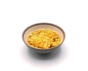 Instant noodles in bowl isolated on white background