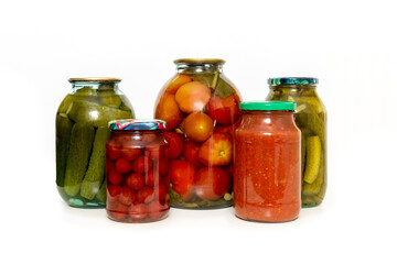 glass jar with marinated vegetables, jar of pickled tomatoes, jars of pickled vegetables, homemade preparations for the winter in glass jars