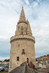 Fototapeta na wymiar The Lantern Tower of La Rochelle in the medieval old town. La Rochelle is a coastal city in southwestern France