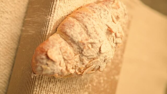  Homemade sweet bread on a rustic background. Fresh sweet bakery. Freshly sweet baked bread. Artisan bakery concept