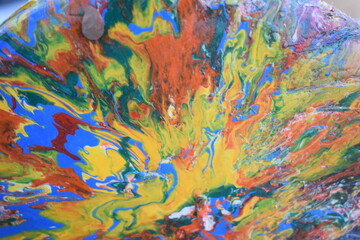 Fototapeta na wymiar Colors on an artwork making a diluted effect