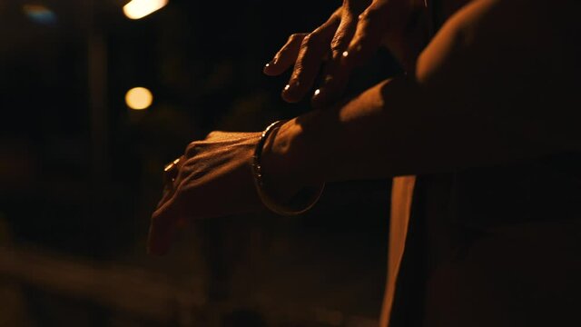 girl stroking her hand close-up in the evening light