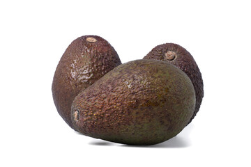 Three ripe organic green avocado isolated on a white background