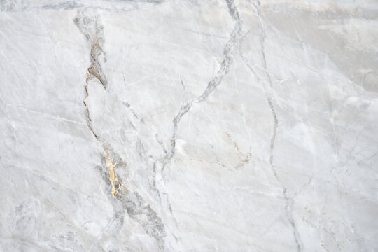 Textura natural de mármore quartzito cinza em close up para fundo de cena luxuoso para decoração de interiores e design.