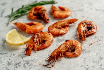 grilled giant prawns on a stone background