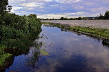 Fototapeta na wymiar Strengthening the banks of the Iren River