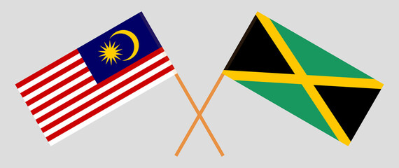 Crossed flags of Malaysia and Jamaica. Official colors. Correct proportion