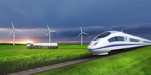 High speed train travels on a background of green fields.