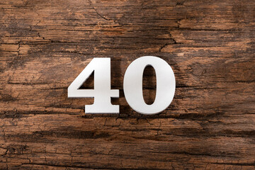 forty 40 - White wooden number on rustic background