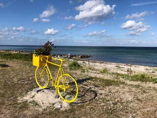 Old, yellow bike by the sea, Nyborg, Denmark