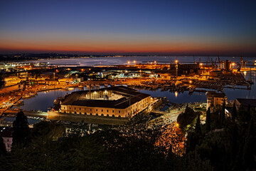 Ancona, Marche, Italy: night landscape of the port for the small boats and fishing vessels with the...