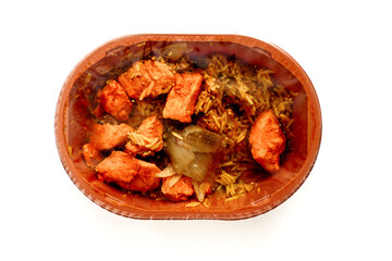Chicken jalfrezi dish in a plastic bowl