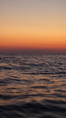 sunset on the sea vertical with gradient background