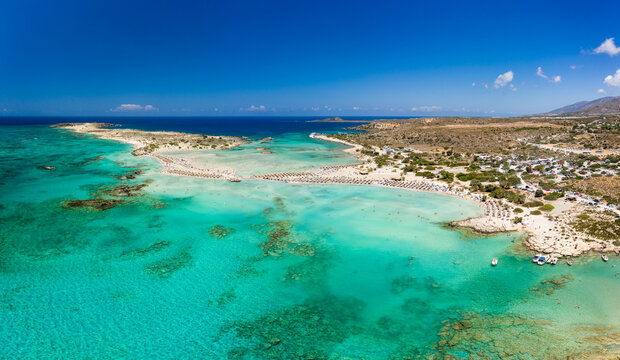 Aerial panoramic view of a narrow sandy beach and beautiful tropical lagoons (Elafonissi, Crete)