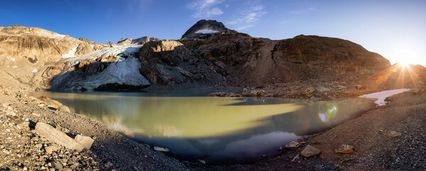 Panoramic View of Vibrant Colorful Glacier Lake up in Rocky Mountains in Canadian Nature Landscape....