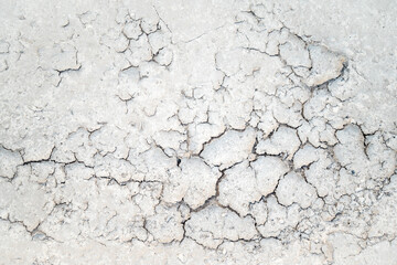 White sand background pattern on the beach with cracks