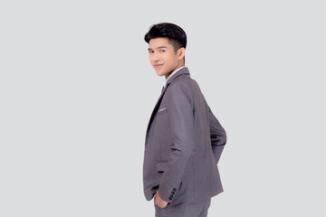 Portrait young asian businessman in suit with confident and friendly isolated on white background, business man smart with success hand in pocket, manager or executive with handsome and leadership.