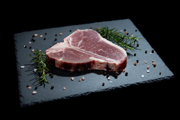 fresh raw meat presentation on granite