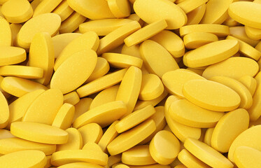 3d rendering of yellow pills, medication Pile up on yellow background, footage