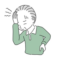 頭が痛い高齢者の男性