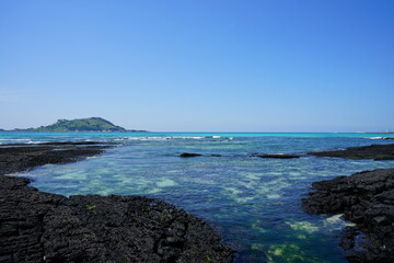a beautiful seascape with an island