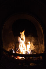 fireplace with burning firewood
