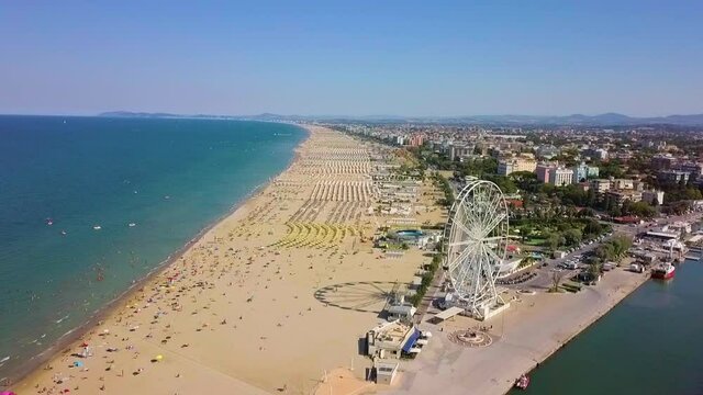 Aerial View Of The Famous Resort And Ferris Wheel In Rimini, Italy - drone shot