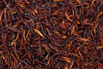 Dried chili peppers combine the color, santas, and the intense heat.