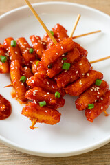 deep fried Korean rice cake (Tteokbokki) skewered with spicy sauce