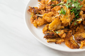 Crispy fried mussel pancake with egg