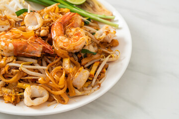 Pad Thai Seafood - Stir fried noodles with shrimps, squid or octopus and tofu