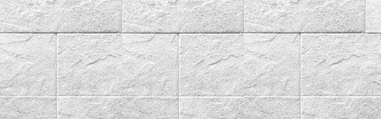 Naklejka premium Panorama of White granite tiled wall with vintage pattern texture and background seamless
