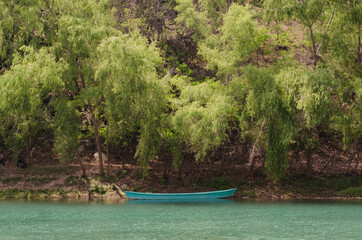 Naklejka na ściany i meble boat on the river