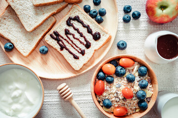 Homemade Granola Muesli Oatmeal for Breakfast Food, Granola With Fresh Fruit and Bread Bake for Breakfast. Natural Baked Muesli and Mixing Fruits for Morning Meals. Nutrition Homemade Granola Food