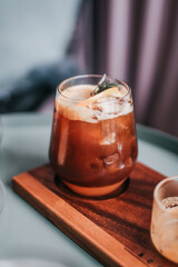 Orange and coffee non-alcoholic cocktail refreshing recipe idea. Alternative drinks making for healthy lifestyle.