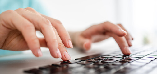 Woman hands with laptop