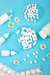 Assortment of different pills and medical bottles. Concept of illness and treatment. Medicine and healthcare.
