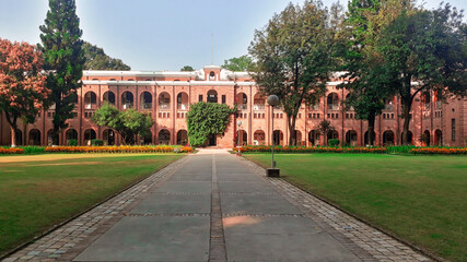 Front view of the colorful building of Doon school for boys
