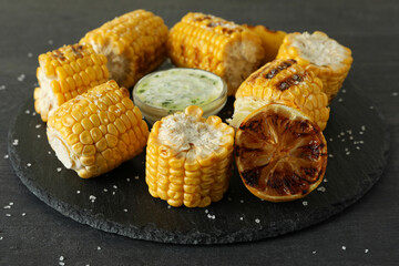 Concept of tasty food with grilled corn