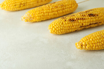 Concept of tasty food with grilled corn