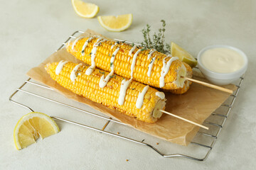 Concept of tasty food with grilled corn