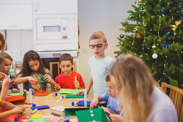 Kids make applications on Christmas holiday Eve