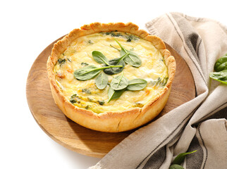 Plate with tasty spinach tart on white background
